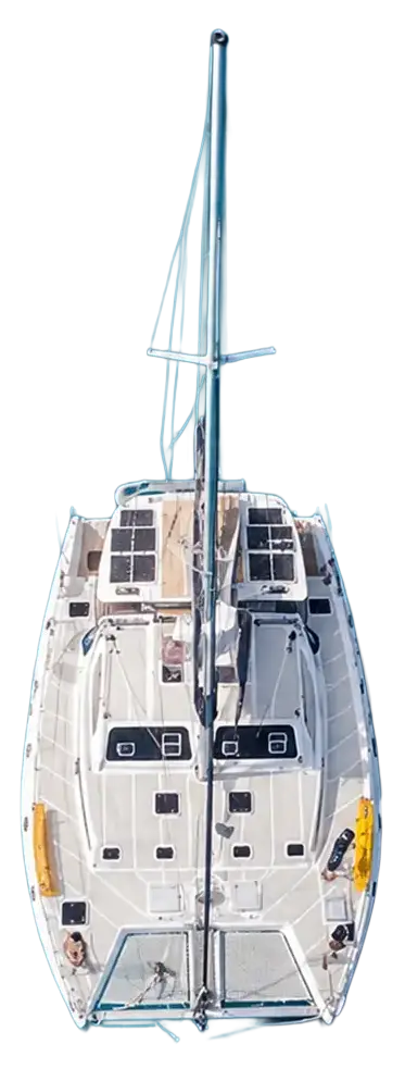 Top-down view of a white catamaran sailing on blue water with two yellow life rafts.